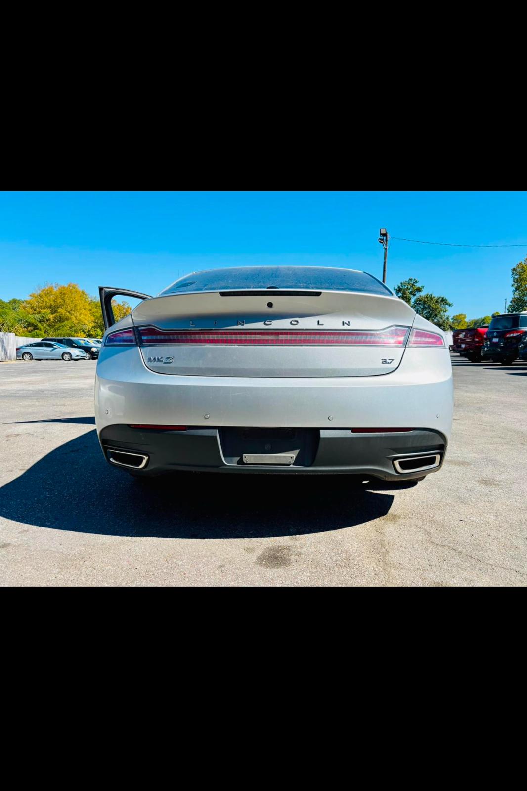 2013 LINCOLN MKZ with only 126,xxx miles!