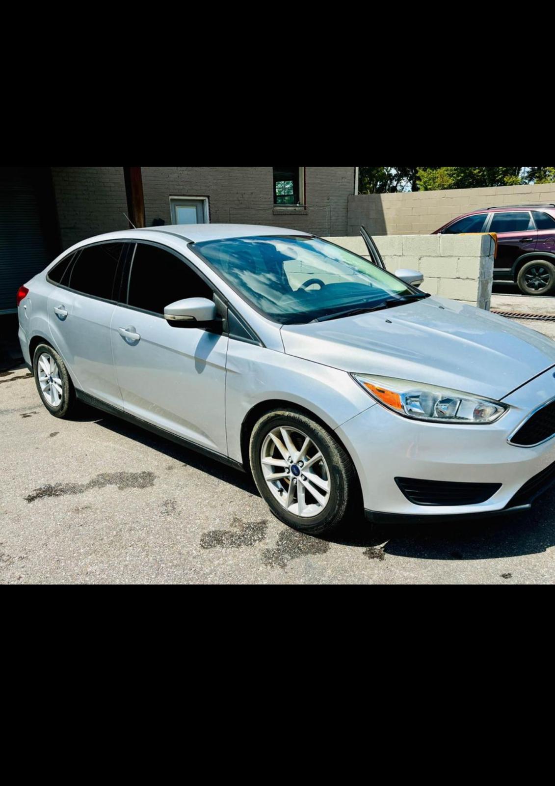 2017 FORD FOCUS SE with only 99,xxx miles!